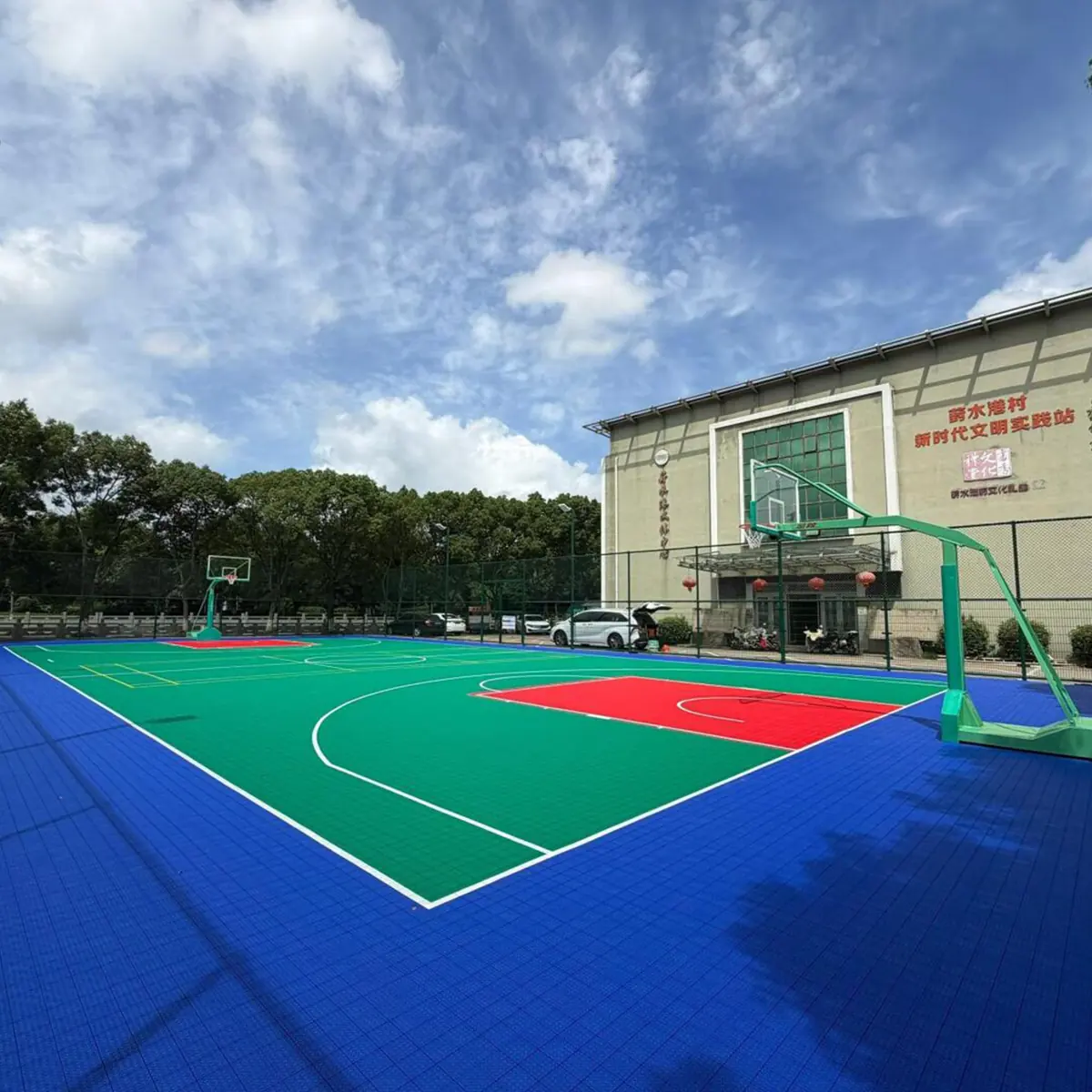 Completed outdoor basketball court with clear line markings